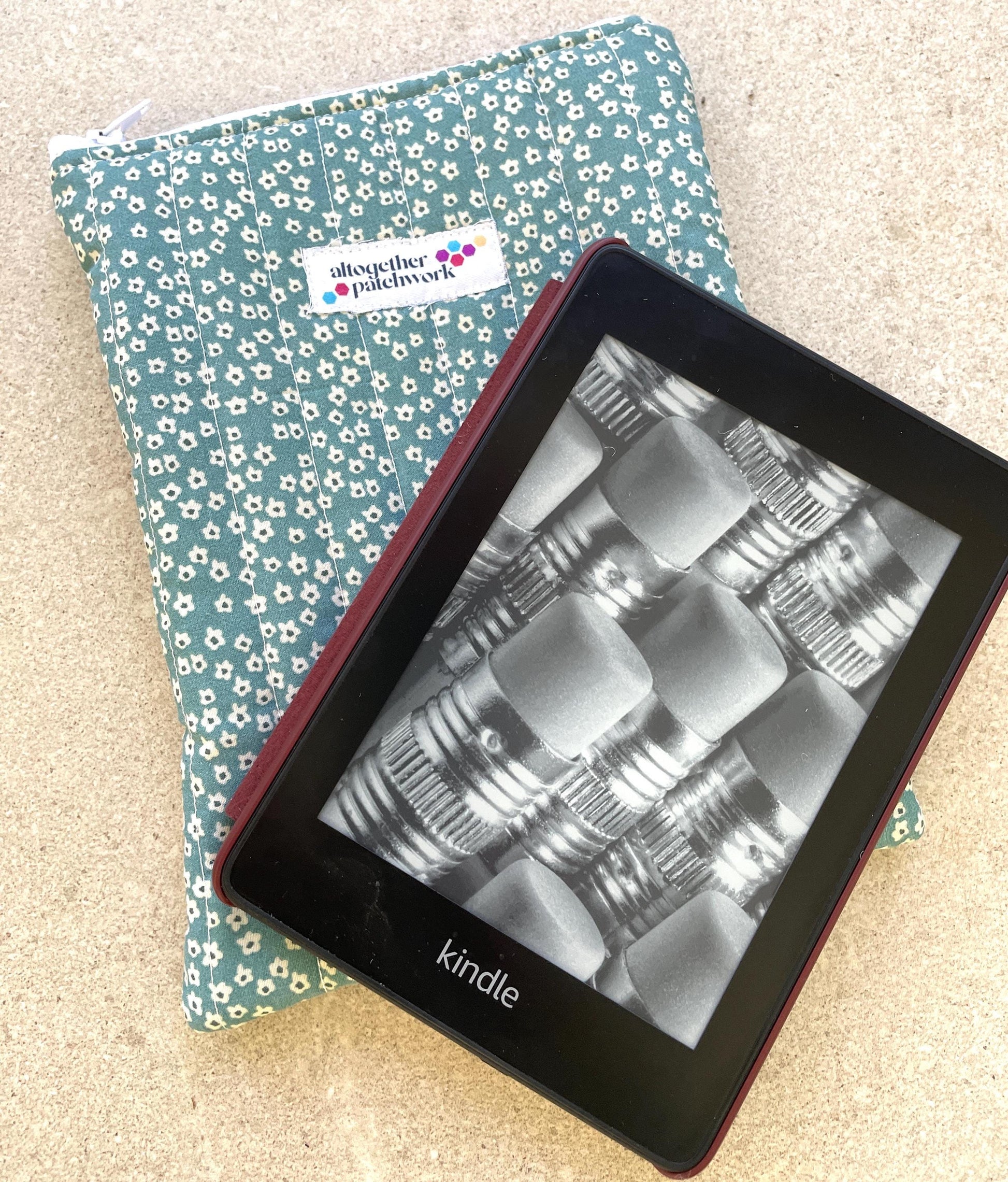 Quilted handmade kindle pouch ereader tablet fabric sleeve for book lover.