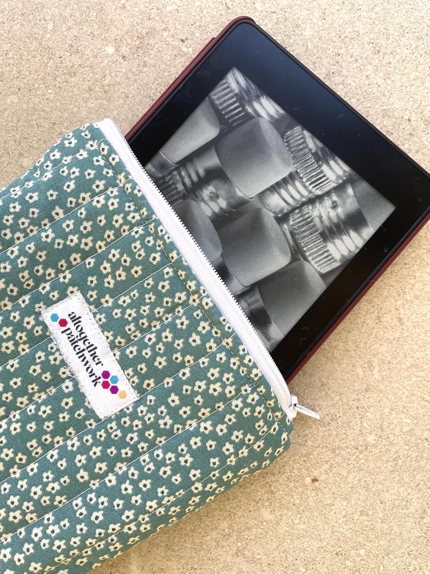 Quilted handmade kindle pouch ereader tablet fabric sleeve for book lover.