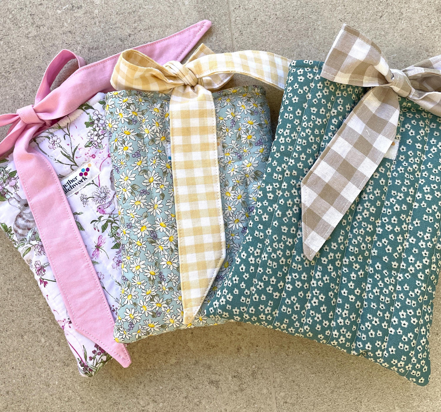 Quilted handmade kindle pouch ereader tablet fabric sleeve bow ties for book lover.
