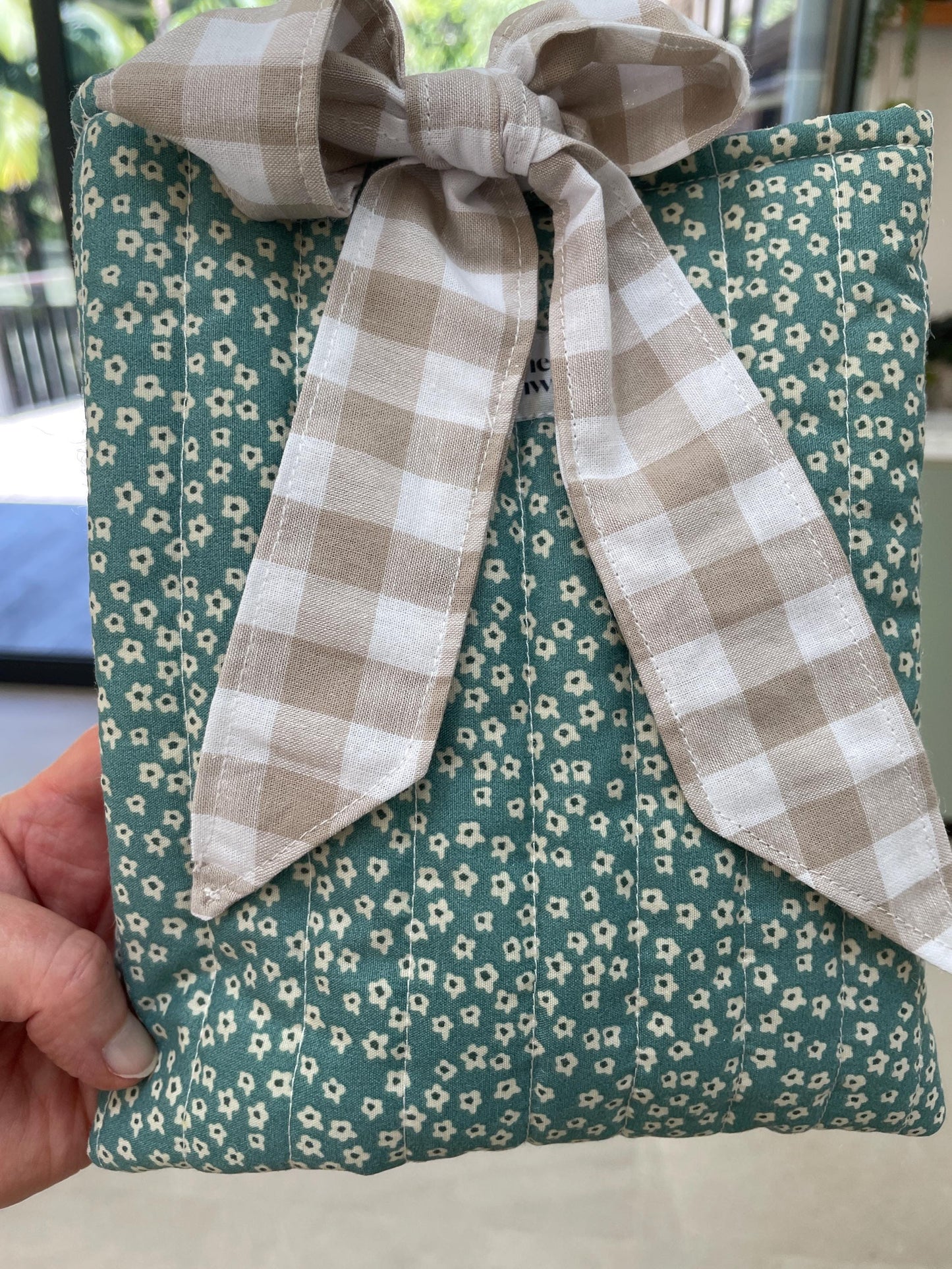 Quilted handmade kindle pouch ereader tablet fabric sleeve bow ties for book lover.