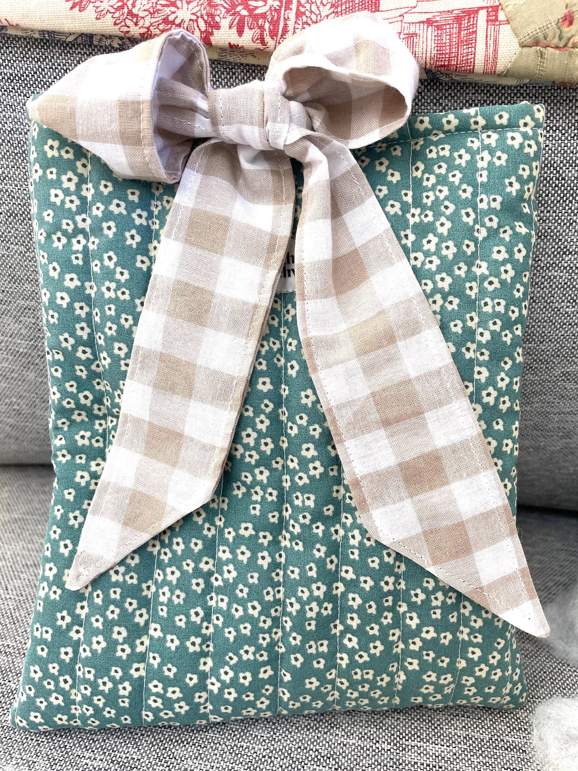 Quilted handmade kindle pouch ereader tablet fabric sleeve bow ties for book lover.