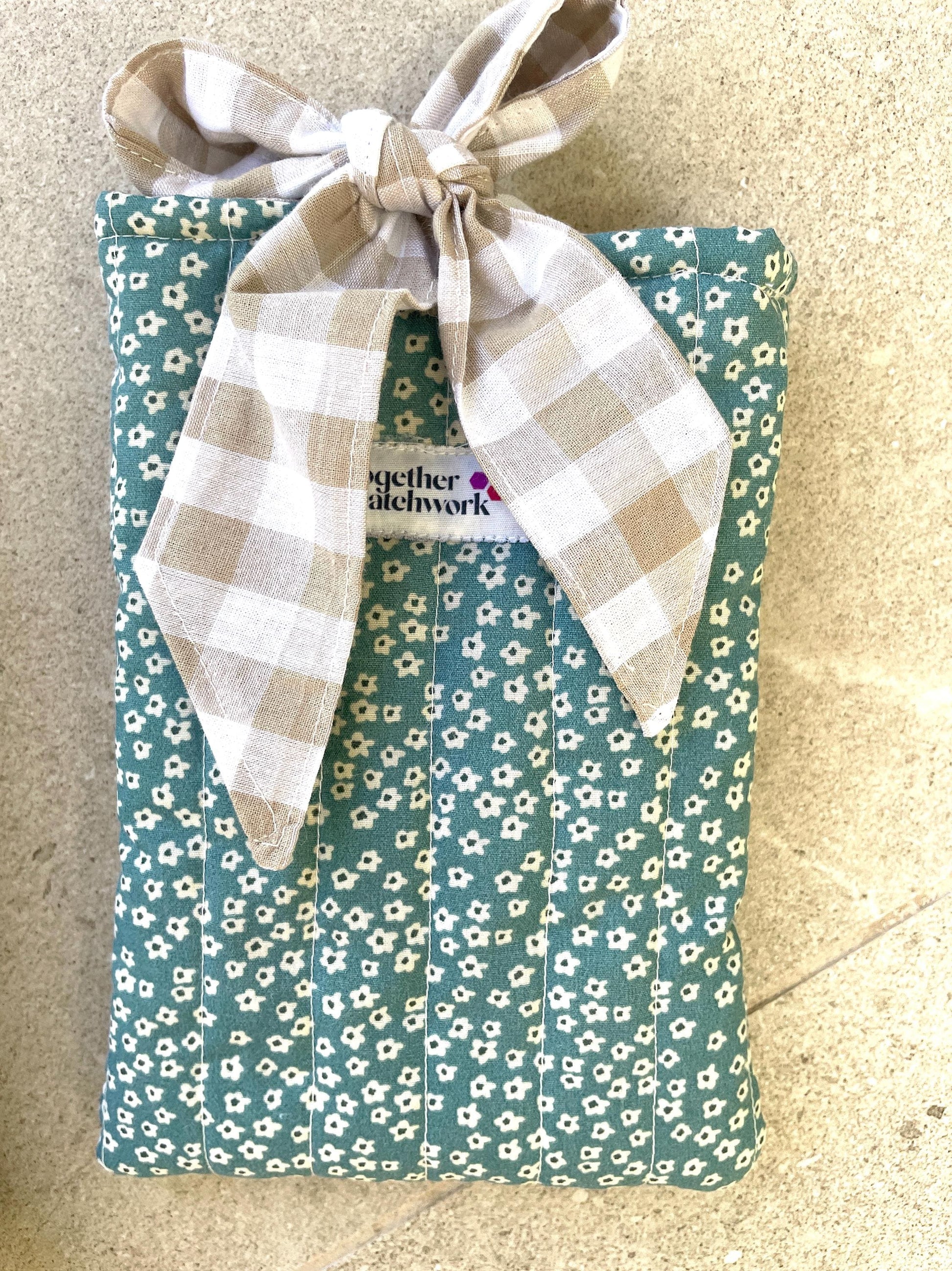 Quilted handmade kindle pouch ereader tablet fabric sleeve bow ties for book lover.