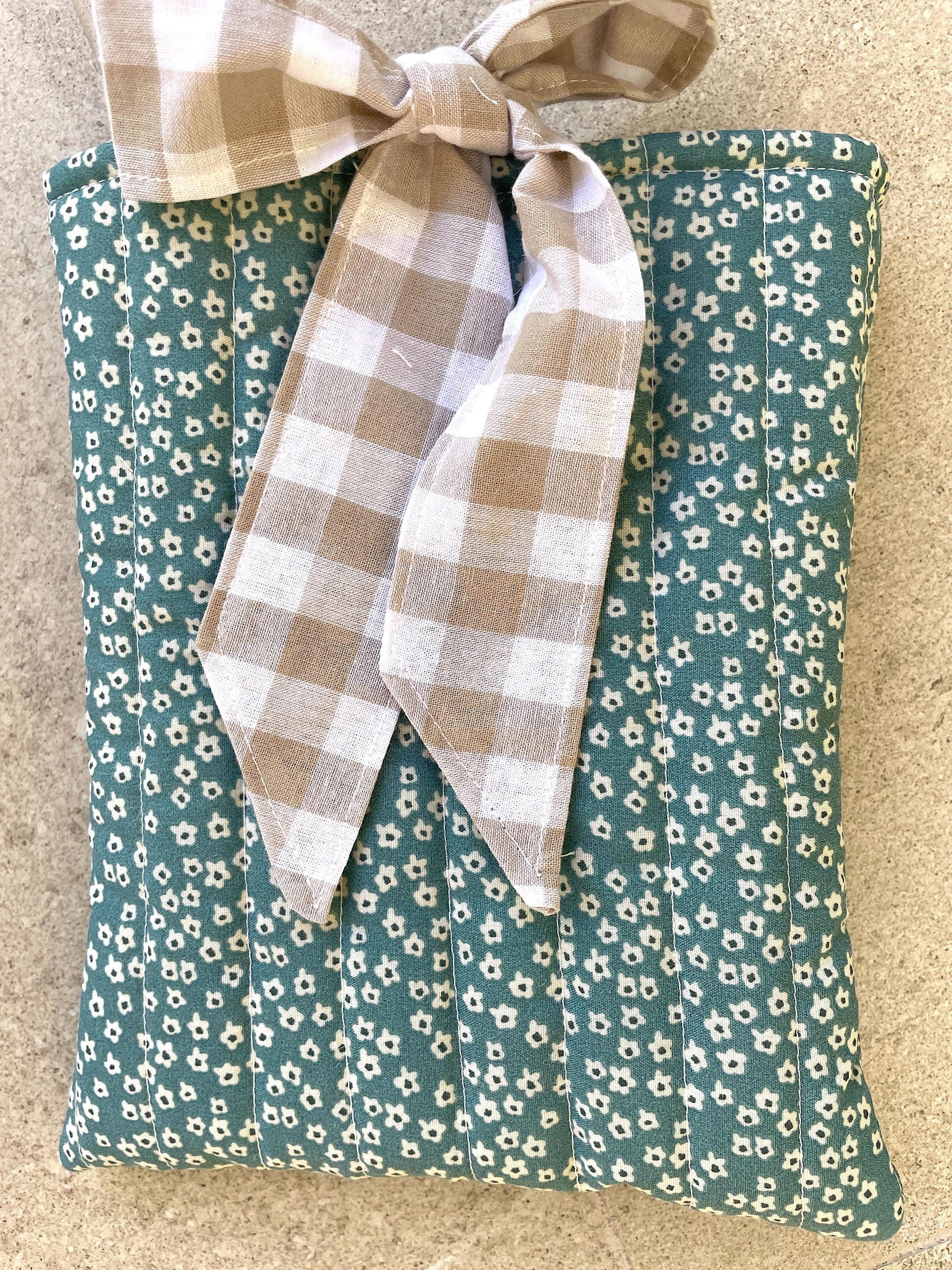 Quilted handmade kindle pouch ereader tablet fabric sleeve bow ties for book lover.