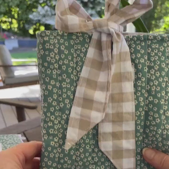 Quilted handmade kindle pouch ereader tablet fabric sleeve bow ties for book lover.
